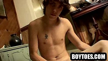 Horny Hunk Tugging His Cock And Showing Off His Feet