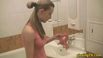 Girl Pisses Sitting In The Toilet