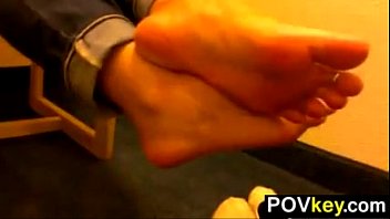 Pretty Girl Teasing Her Feet Close Up