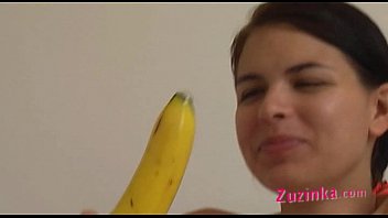 How-to: Young Brunette Girl Teaches Using A Banana