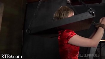 Stripping Inside A Tiny Metallic Cage - Video 5529709