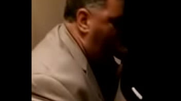 Suited Blows In Public Toilet