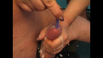Mistress Inserting Toothrbush In A Guy' Cock While She Jerks And Makes Him Cum