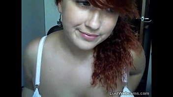 Busty Redhead Shows Off Her Feet On Webcam