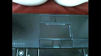 Brownhaired Girl Curled Up On Chair Bating