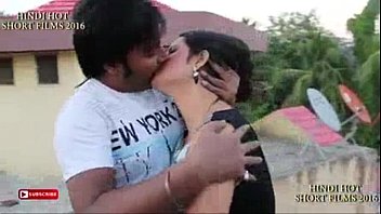 Couple On Top Of Building