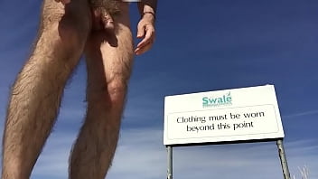 At The Nudist Beach