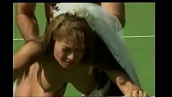 Asian Bride On A Tennis Court