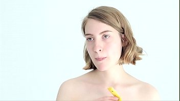 Teasing Blonde Babe Playing With A Banana