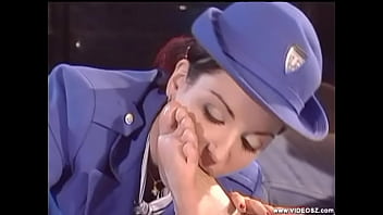 Female Traffic Cop Licks Male Feet