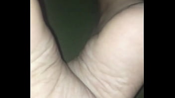 Her Soles, And A Lil Leg.