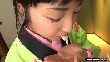 Asian Bitch In A Kimono Sucking On His Erect Prick