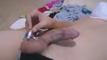 Sissy Ashely Smokes While Playing With Self _ Buring Dick Head