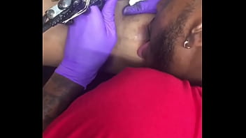 Horny Tattoo Artist Multi-tasking Sucking Client' Nipples