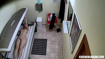 Older Milf Tanning Her Shaved Tight Pussy