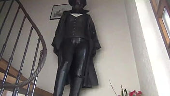 The Black Rubbermisstress In Sun Light