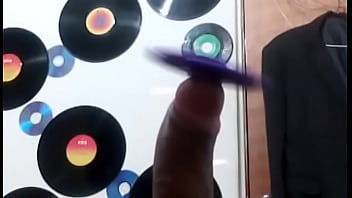 Bi Teen Boy Playing With Fidget Spinner Toy