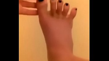 Babe Lickingn Sucking, And Sniffing Her Feet In The Bathroom