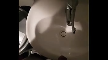 Man Pissing In Sink In Restuarant
