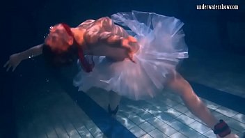 Bulava Lozhkova With A Red Tie And Skirt Underwater