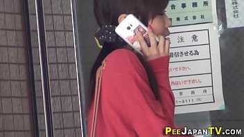 Asian Pisses In Car Park