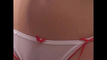 Julia Shows Off Her Assets By The Door