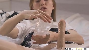 Lesbiancums.com ⇨ Kinky Teen Teasing And Masturbating With Strapon