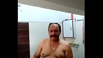 Indian Old Man Take Bath