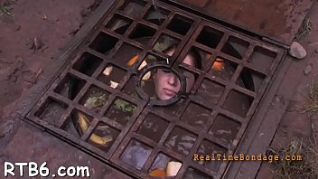 Caged Cutie Removes Her Charming Clothings In Captivity