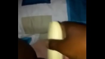 Ugandan Girl Carol Uses A Banana