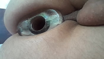 Playing With An Anal Tunnel Plug And Vibrator Egg