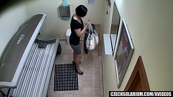 Brunette Sexy Girl Relaxing In Solarium