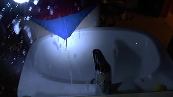 Peeing Blue Underpants Over Sink