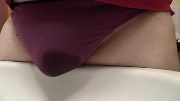 Peeing In Redbrown Underpants Over The Sink