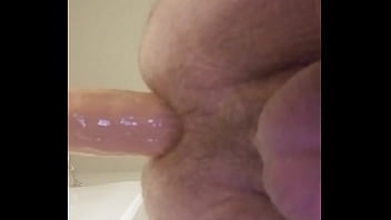 Gay Tries To Fit Large Dildo In Ass
