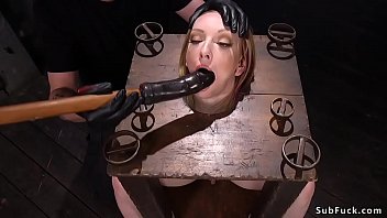 Brunette Slave In Stock Mouth Toyed