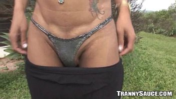 Foxy Redhead Tranny Tugging On Her Cock Outdoors