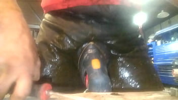 Farm Owner Wearing Leather Covered With Barn