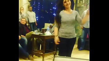 Arab Girl Dancing With Friends In Cafe
