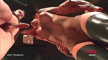 Redhead Slut In Latex Boots