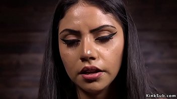 Brunette Fucks Machine On A Wooden Table