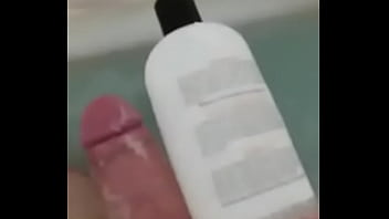 Hungarian Big Dick Measuring Against Family Sized Shampoo Jug