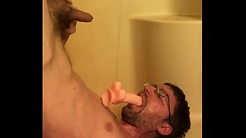 Skinny Nerd Pisses On His Own Face With Dildo In His Mouth