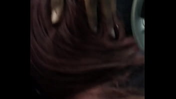 Red Head Gives Head In Car Back Seat
