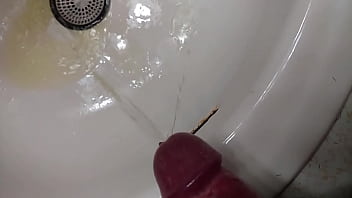 Golden Shower In The Bathroom Sink