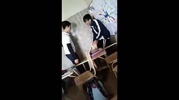 Fat N. And Hidrocefalic Boy With A Chair