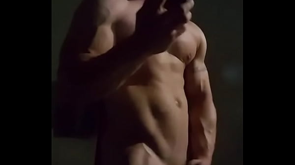 Bald Muscular Guy Having A Wank