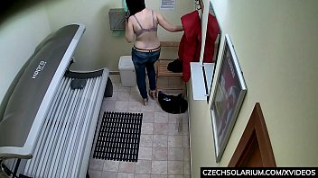 Busty Milf Rubbing Her Pussy In Solarium