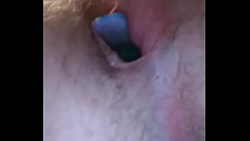 Pushing Out Vibrating Butt Plug