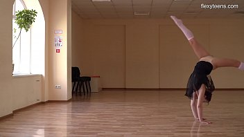 Super Flexible Tonya Making Gymnasts Positions Before The Camera.